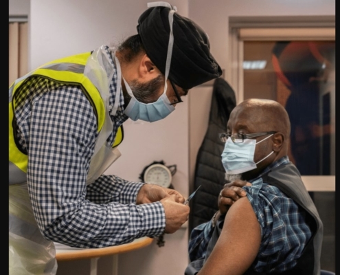 A man receiving a vaccine