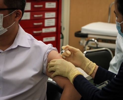 A man receiving the COVID-19 vaccine. Photo Credit: Macau Photo Agency