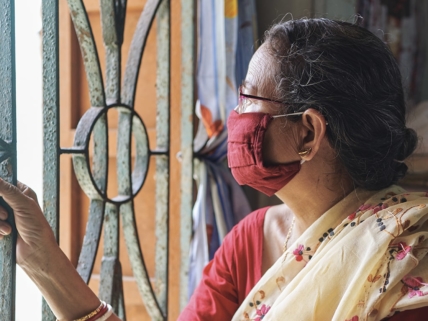 A woman in India wearing a mask