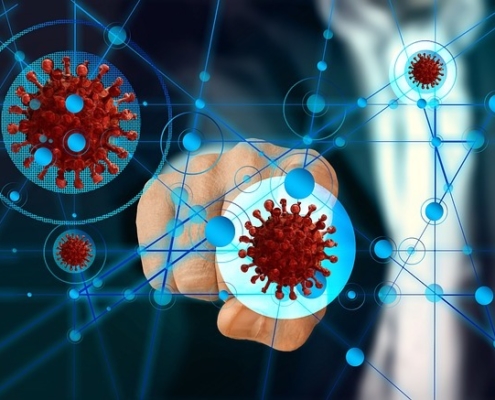 A graphic of viruses and a fist. Photo credit: Pixabay